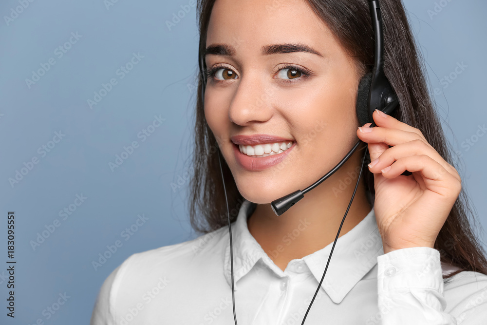 Female consulting manager with headset on color background Female consulting manager with headset on color background