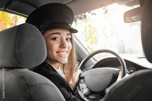 Beautiful female taxi drive...