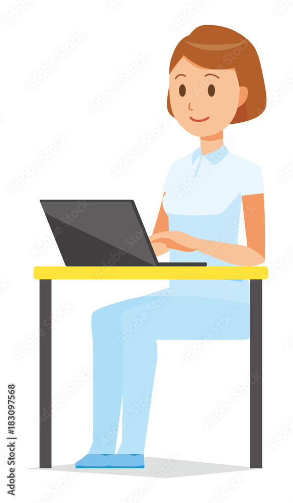 A female nurse wearing a white uniform is operating a laptop computer