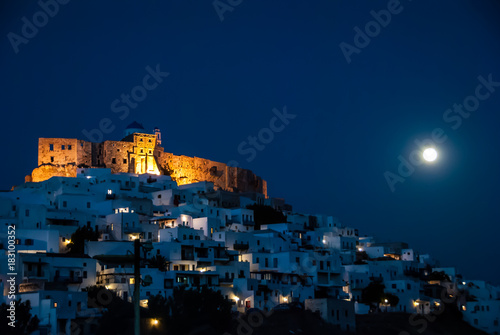 Panoramic view of  the venetian castle on a full moon night in Astypalaia, an Aegean island of Greece