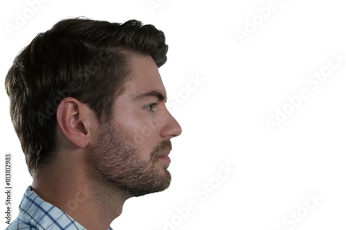 Man standing against white background