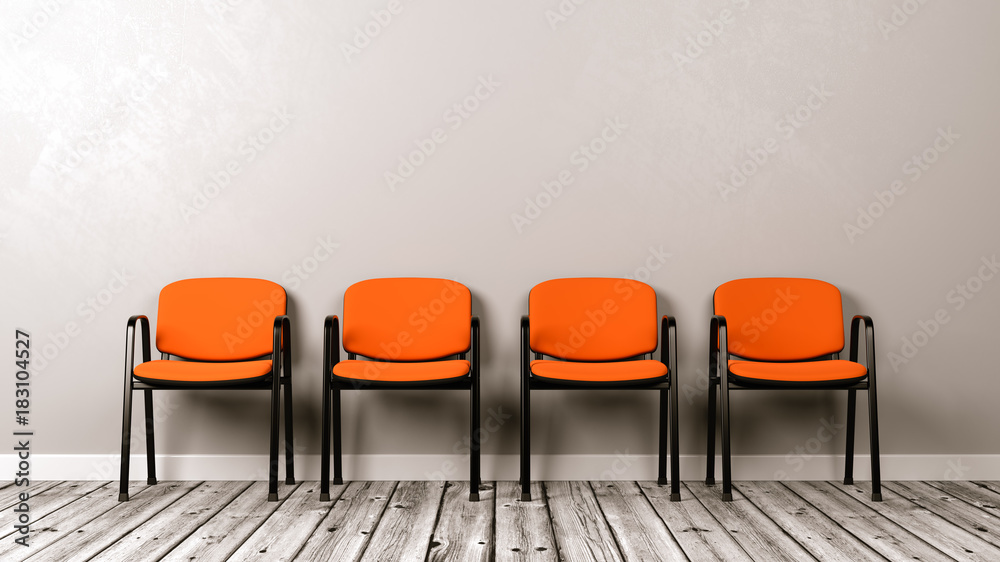 Row of Chairs on Wooden Floor Against Wall