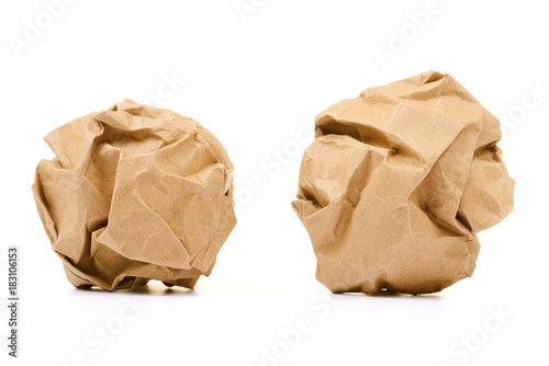 Crumpled brown paper ball isolated on white background