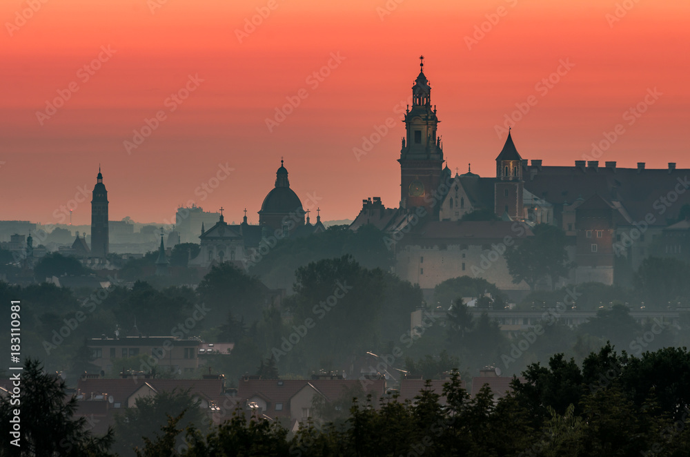 Krakow, Poland, Wawel castle silhouette at sunrise Krakow, Poland, Wawel castle silhouette at sunrise