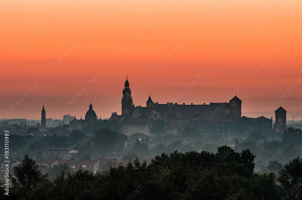 Krakow, Poland, Wawel castle silhouette at sunrise Krakow, Poland, Wawel castle silhouette at sunrise