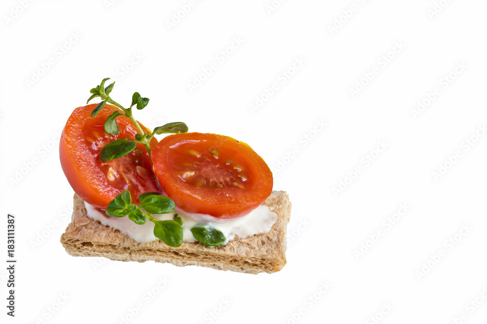 Sandwich with tomato, cheese and rosemary on a white background. Sandwich with tomato, cheese and rosemary on a white background.