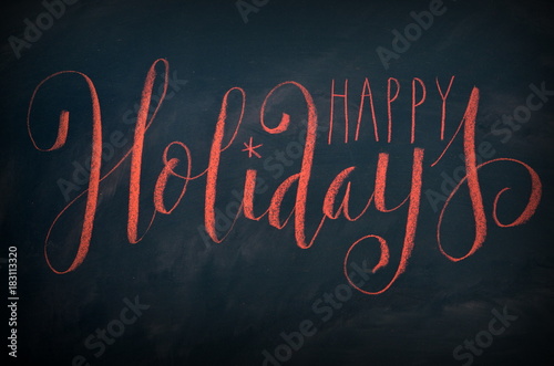 HAPPY HOLIDAYS chalk lettering on blackboard