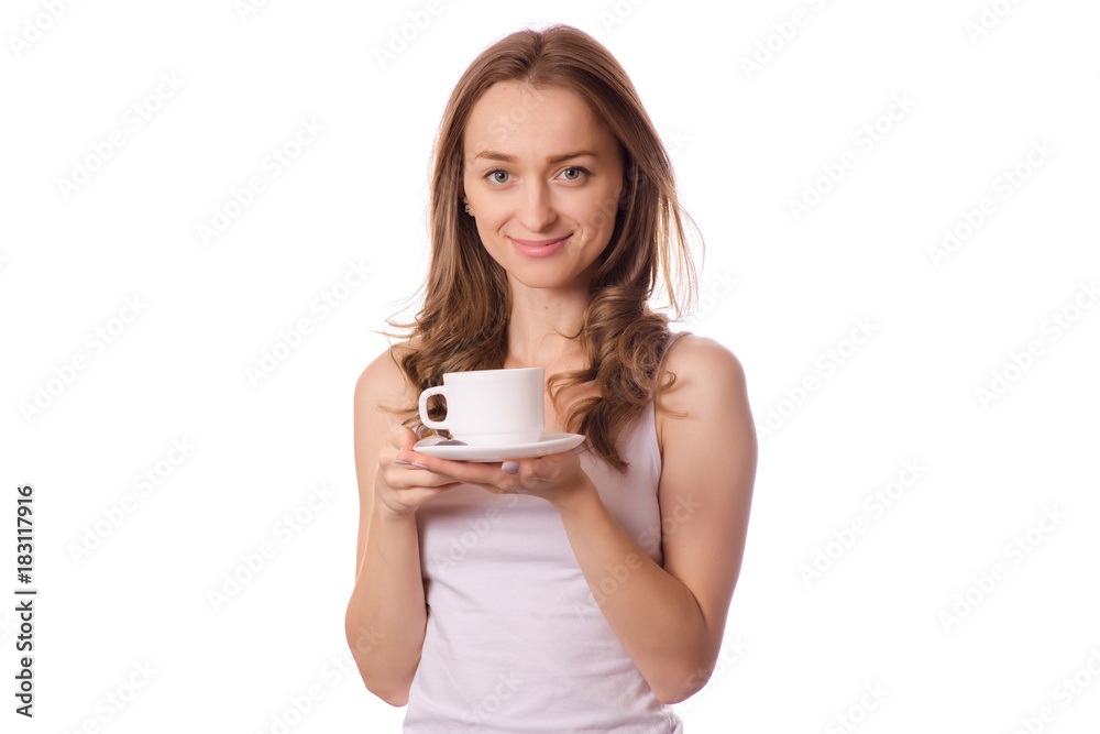 Beautiful young woman holding a white cup and saucer with coffee tea Beautiful young woman holding a white cup and saucer with coffee tea