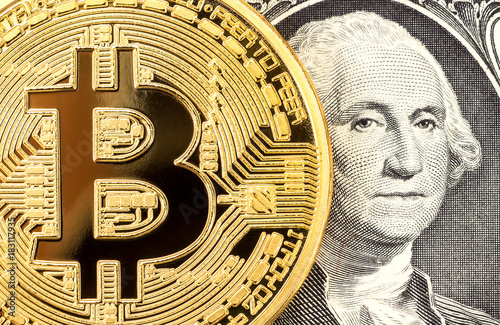 Cryptocurrency of the Bitcoin with portet of President George Washington close up. Business concept of virtual money photo