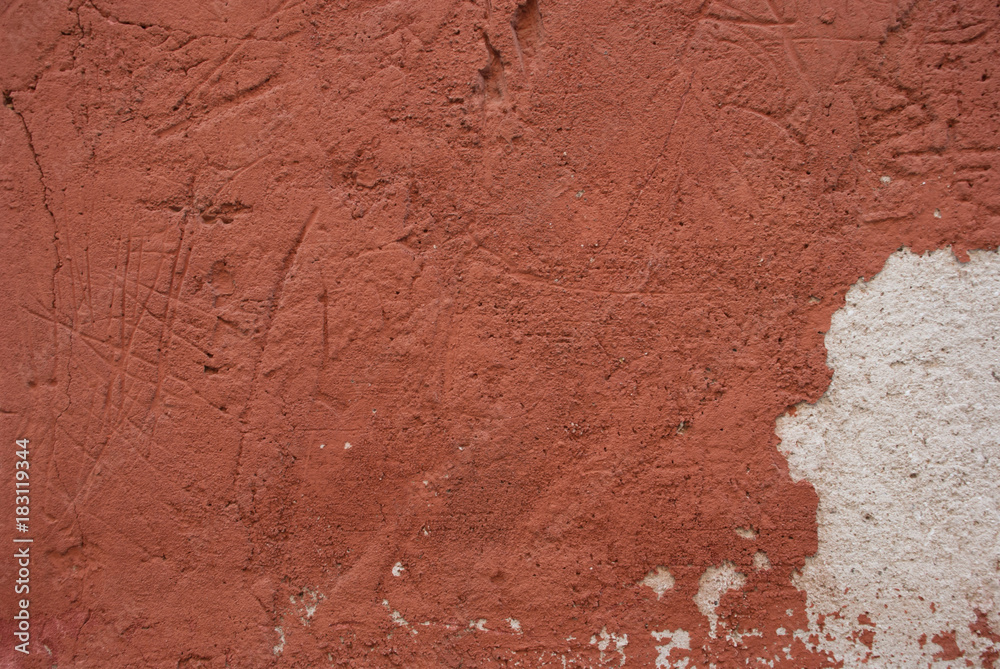 Background witn peeling red color. Old, grange wall. Wallpaper textured urban.
