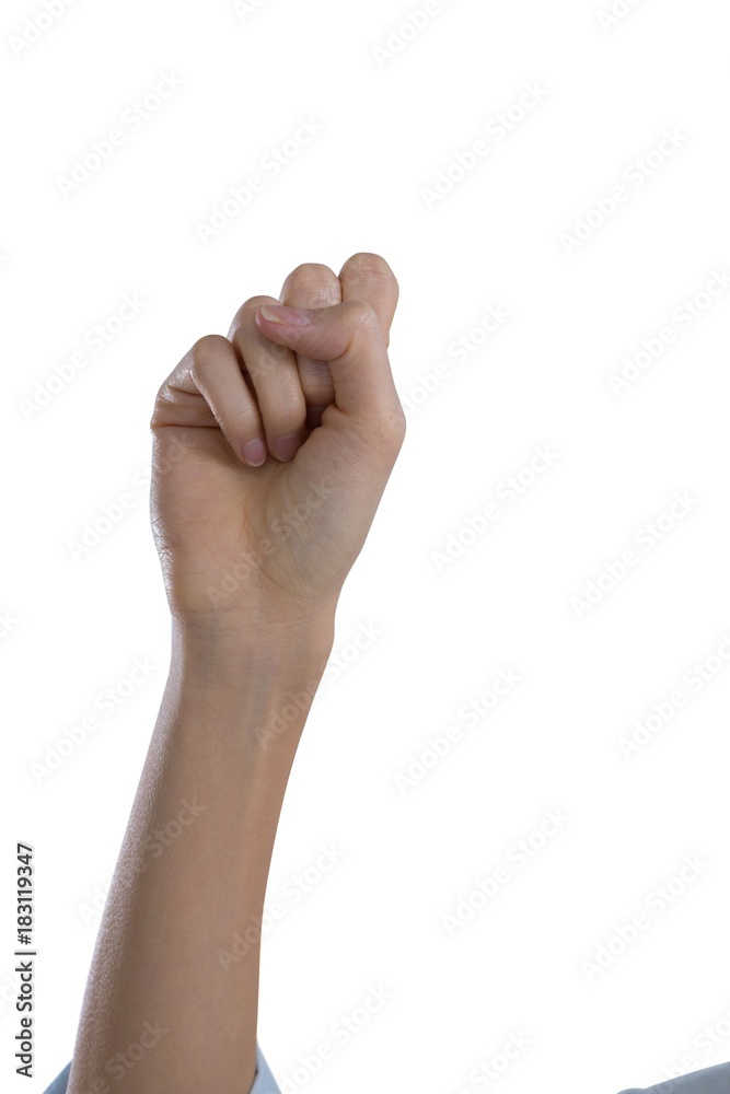 Womans hand forming fist Womans hand forming fist