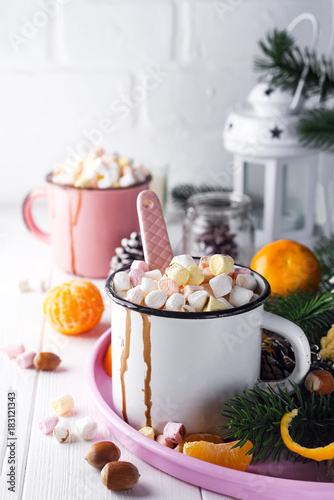 two cups with hot chocolate or cocoa with melted marshmallow