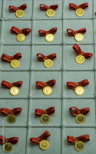 Plenty of geniune gold coins in view photo