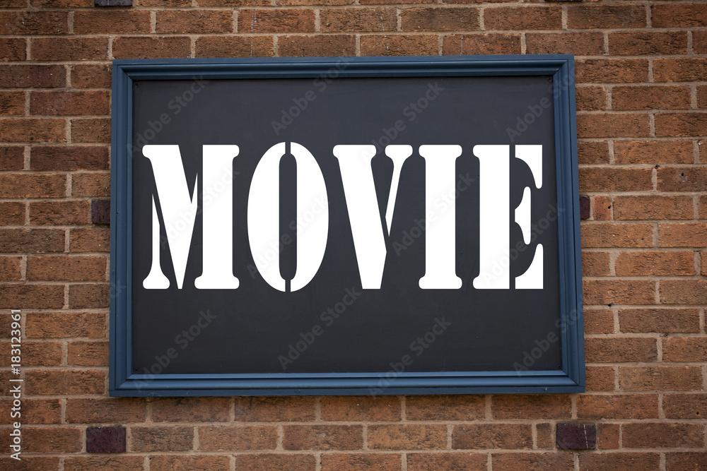 Obraz premium Conceptual hand writing text caption inspiration showing announcement Movie. Business concept for Entertainment Movie Film written on frame old brick background with copy space