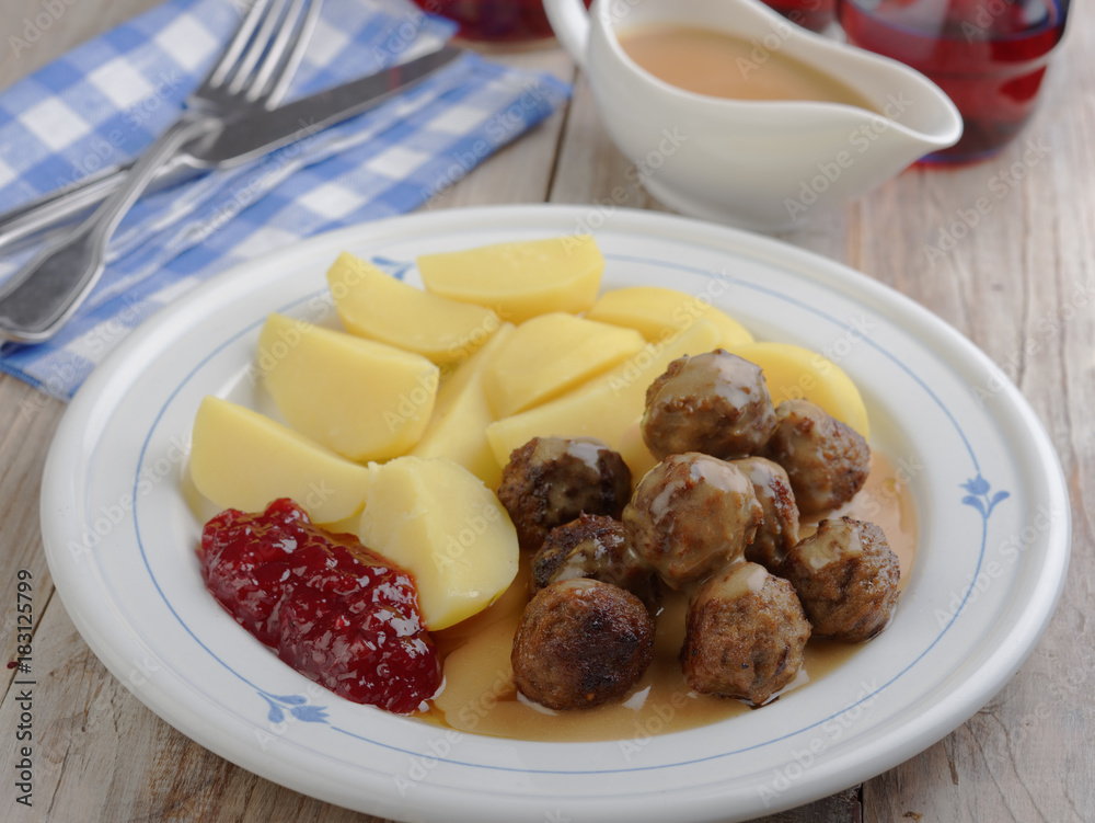 Swedish meatballs with boiled potato and jam