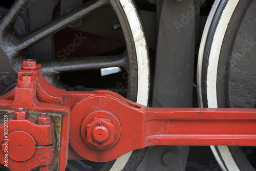 Close-up of old steam locomotive wheels, now tourist attraction