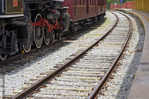 Close-up of old steam locomotive wheels, now tourist attraction