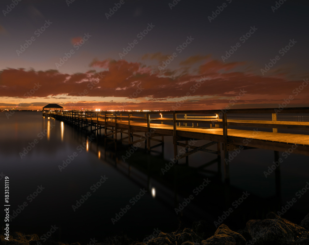 long pier in the blue hour sunset