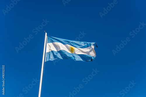 Argentina flag waving against blue sky on a sunny day 
