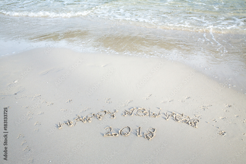 Fototapeta premium Happy New Year 2018, lettering on the beach, Year of the Dog2018