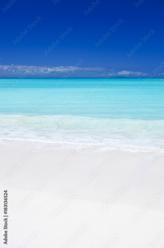 Clean White Caribbean Beach With Blue Sky, Antigua Clean White Caribbean Beach With Blue Sky, Antigua