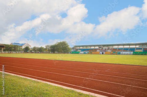 running track in stadium on blue sky for athletics and competition in university © smolaw11