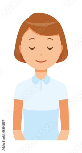 A female nurse wearing a white uniform bows