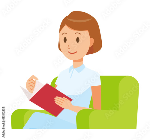 A female nurse wearing a white uniform is sitting on a sofa and reading books