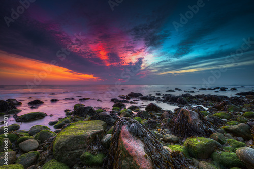 Obraz na płótnie Pre-dawn minutes colorful sunrise explosion of colors. Montauk, Long Island, NY w salonie