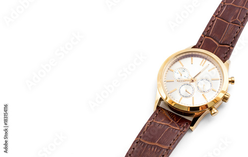 Golden wrist watch on white background.