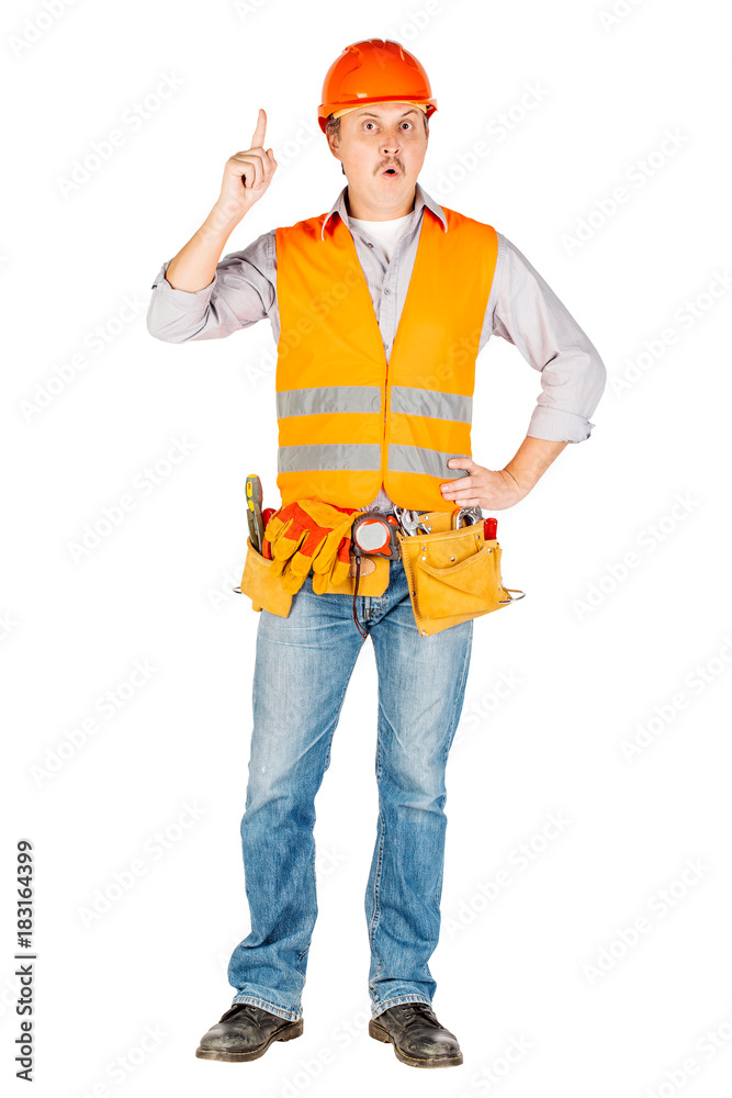 builder in a helmet pointing finger up and looking at camera builder in a helmet pointing finger up and looking at camera