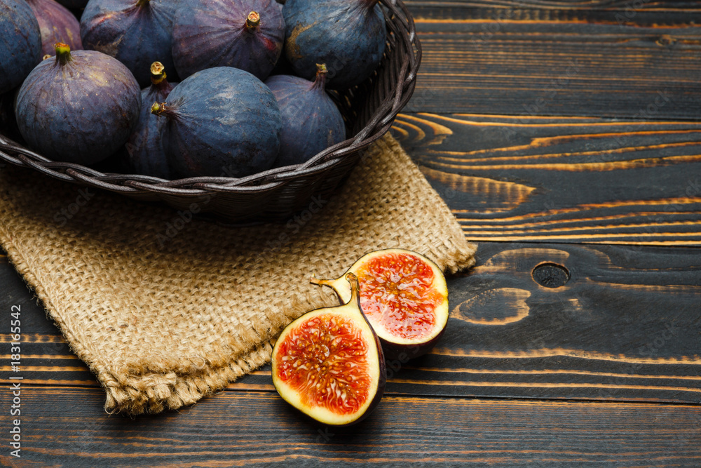 Fig isolated on wooden background