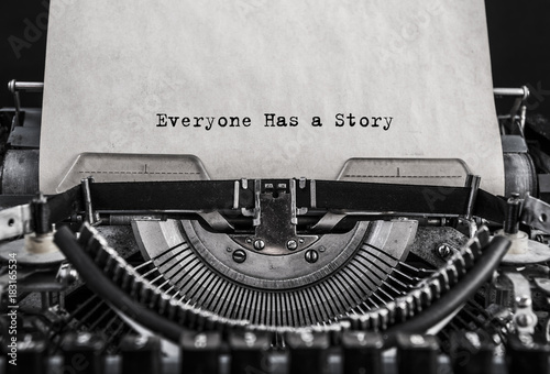 Photography Everyone Has a Story typed words on a old vintage typewriter