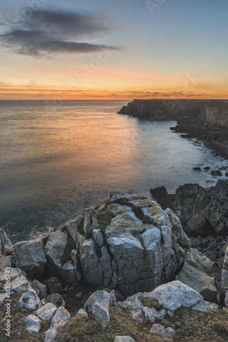 Stunning vibrant landscape image of cliffs around St Govan's Head on Pembrokeshire Coast in Wales