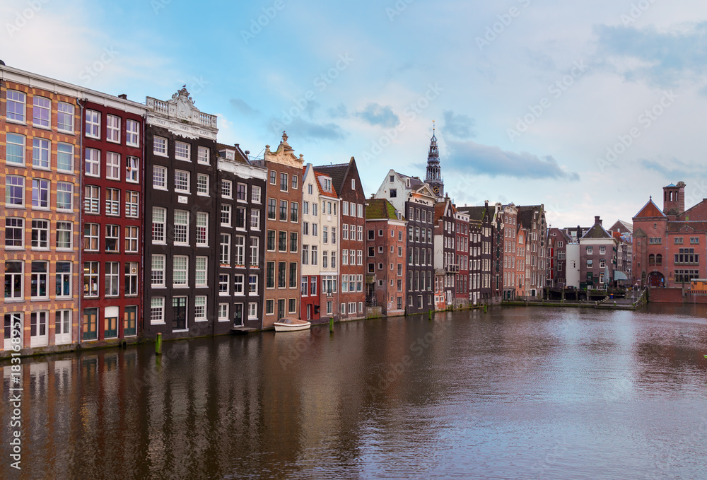 Typical dutch historic houses over canal, Amsterdam, Netherlands, retro toned