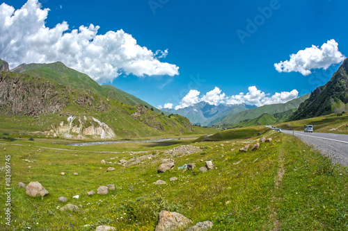 Summer mountain landscape with road