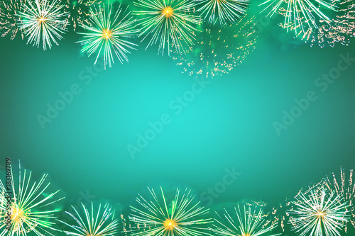 Fireworks display as flowers on bright green sky background with copy space