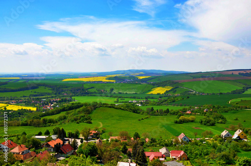 Beautiful view of slovakian countryside, slovak nature with village, fields, meadows panorama scenery photo