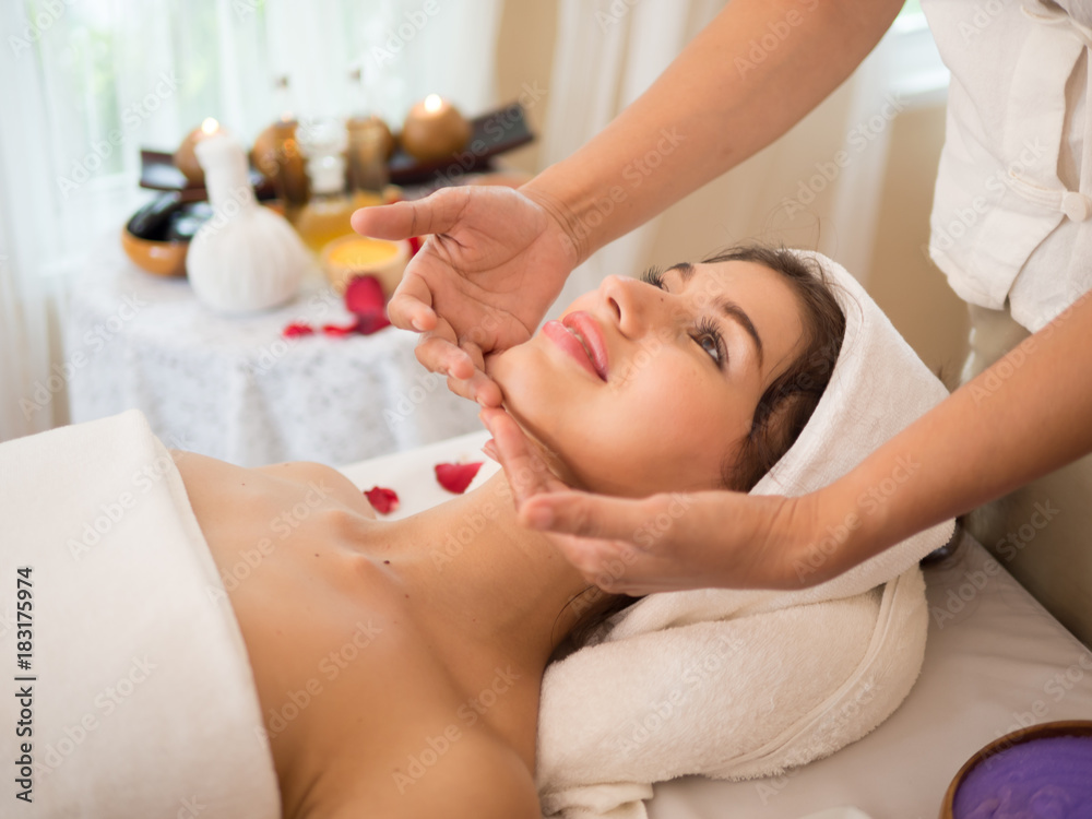 Face Massage. Close-up of a Woman Getting Spa face Treatment.