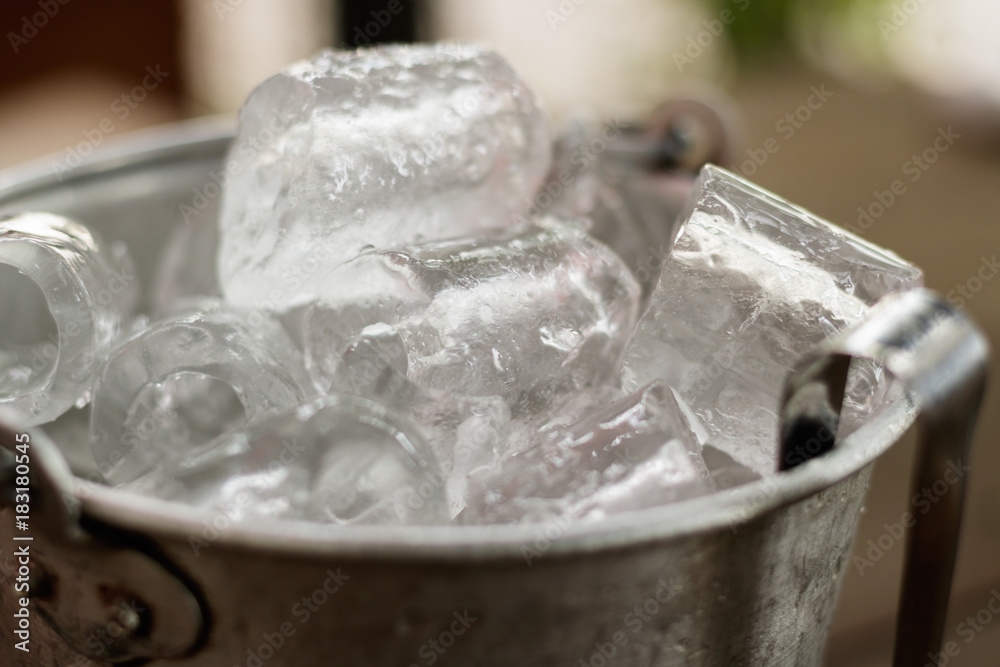 ice bucket on wooden table ice bucket on wooden table