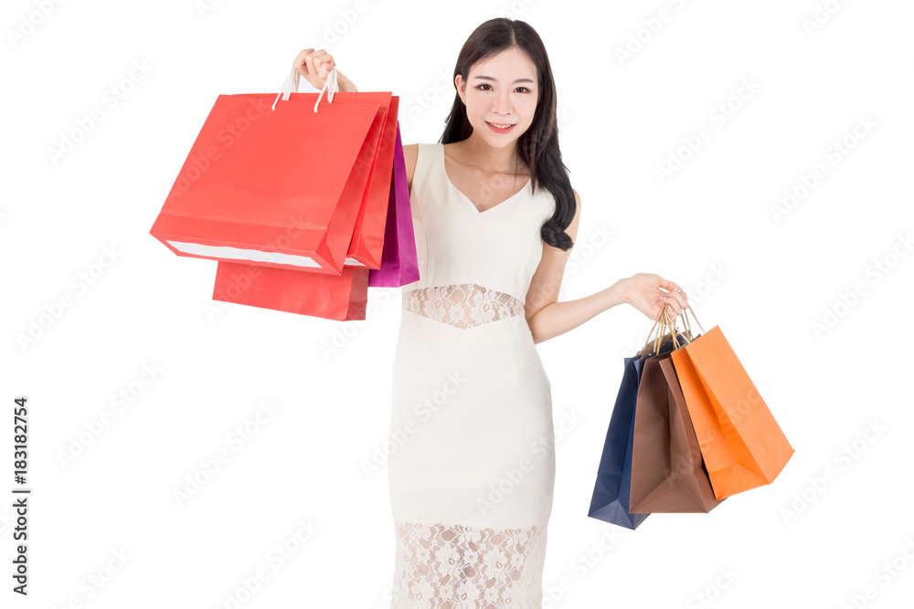 Happy woman holding shopping bags isolated on white background Happy woman holding shopping bags isolated on white background