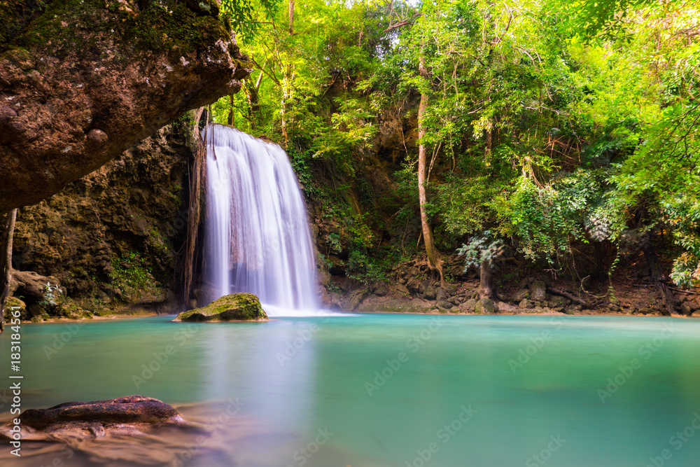The beauty of limestone waterfall is popular with tourists. And famous of Thailand. In Erawan Waterfall National Park Kanchanaburi The beauty of limestone waterfall is popular with tourists. And famous of Thailand. In Erawan Waterfall National Park Kanchanaburi