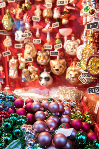 Christmas decorations in the shop offer. Stand with traditional Christmas decorations on the Christmas market.