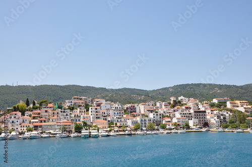 Skopelos island seaside coastline town with buildings  typical greek view  Greece