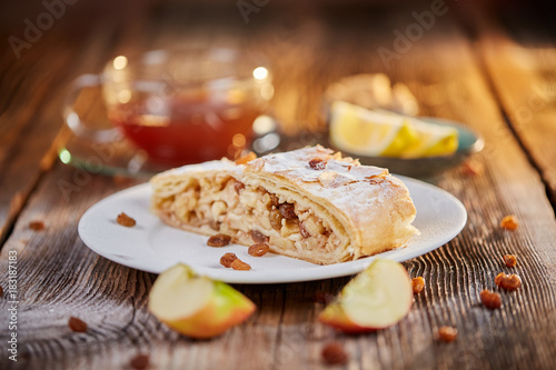 Apfelstrudel with raisins on a plate