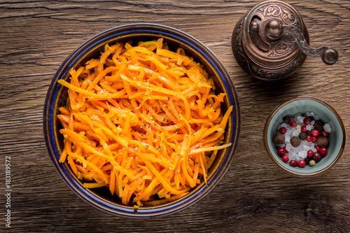 Korean carrots in a bowl, traditional appetizer, Asian style, tatsy food photo