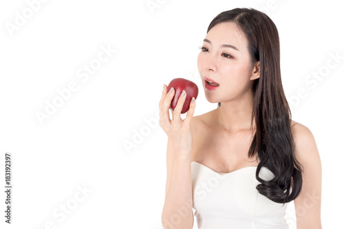 Beautiful woman holding apple isolated on white background