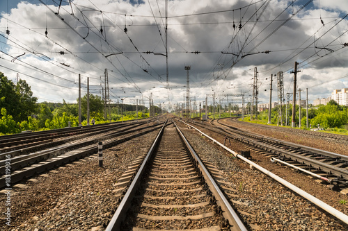 Train tracks go over the horizon line