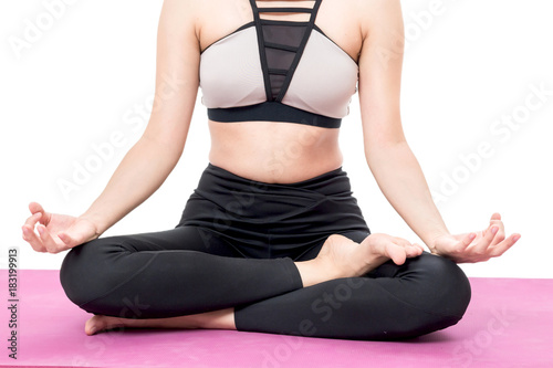 Woman practicing yoga isolated on white background