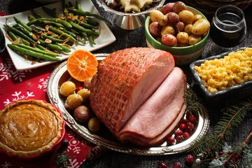 Honey Smoked Ham with sides and xmas desserts/ Christmas Holiday Dinner conept